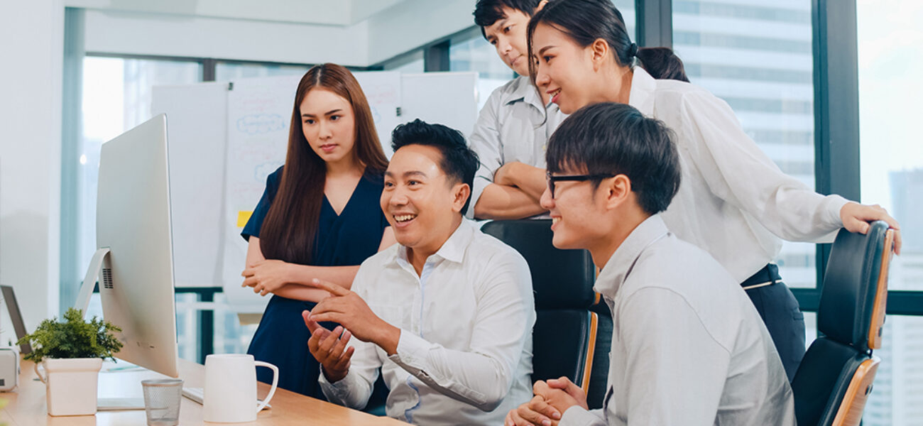 Millennial group of young businesspeople Asia businessman and bu